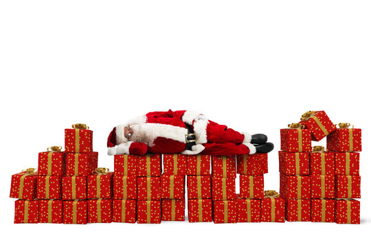Santa Claus sleeping over Christmas gift packs