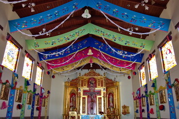Fototapeta premium Decorated interior of a chapel at the Mitad del Mundo park in the suburbs of Quito, Ecuador