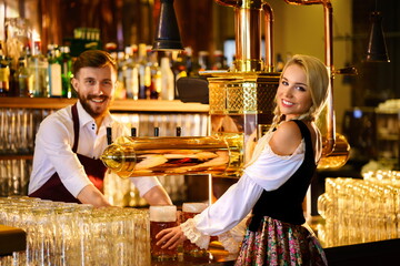 Bartender and waitress at the pub