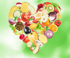 Vegetable and fruit forming a heart. Healthy food for wellness concept