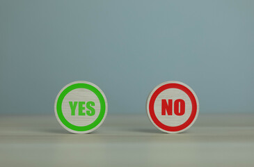 wooden block yes or no symbol and checkmark Alternative concepts, decision making, and true and false test questions.