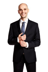 Studio shot of cheerful elegant young man against white background.
