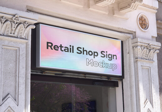 Modern Retail Sign Mockup with Reflections on a Classic Building