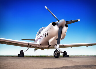 Fototapeta premium picture of a sports plane against a blue sky