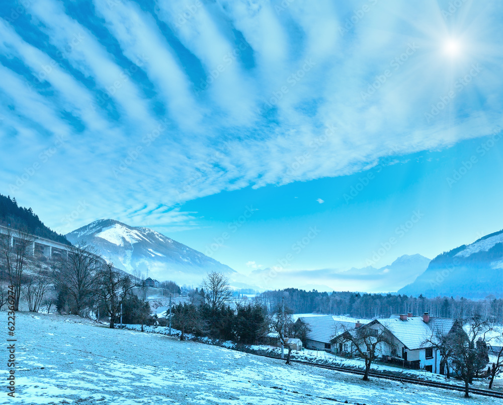 Canvas Prints Winter mountain sunshiny village hazy landscape (Austria).