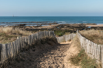 Fototapeta na wymiar Path on the dunes of la Paracou in Les Sables d'Olonne , France