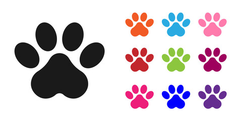 Fototapeta premium Black Paw print icon isolated on white background. Dog or cat paw print. Animal track. Set icons colorful. Vector