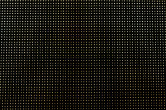 Photo of video wall screen on black background with grid layout of pixels for led display Digital panel with a mesh of diodes.