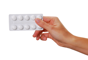 Female hand holding aspirin pills blister isolated on transparent layered background.