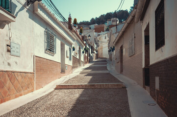 Obraz premium Narrow street in the old residential quarter of Spain, Andalusia