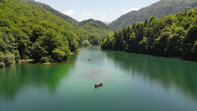 The lake is surrounded by mountains and a beautiful forest. Aerial view. Belgrade lake. Bjelasica national park. Montenegro