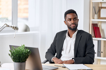 Obraz premium man education freelancer office laptop american african student job computer online corporate