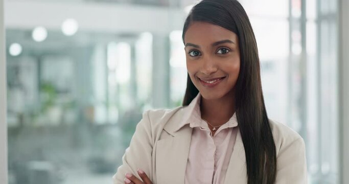 Professional, indian woman and portrait with confidence or arms crossed at office for success with secretary. Happy, employee and business person with girl with pride and positive mindset at job.