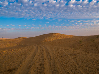 Beautiful sand dunes at sunset. Dramatic sky with Sand Dunes at Rajasthan