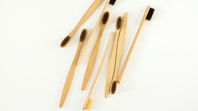 Eco-friendly biodegradable Bamboo toothbrush. No plastic. Conscious minimalism Vegan lifestyle. Reuse reduction concept. High quality 4k footage