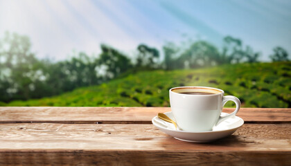 Coffee cup on wooden table, plantations background
