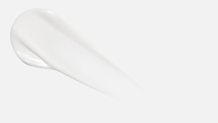 A smear of cream on a white background