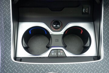 close up of a car cup holder with options BMW 