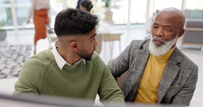 Creative man, coach and computer for software, marketing or team collaboration at office. Senior businessman coaching intern or employee on PC for startup advice, help or training staff at workplace