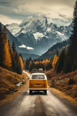 Fototapeten Camper van driving through the mountains © HY