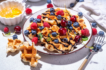Sweet belgian waffles with berry
