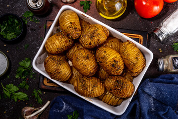 Hasselback potatoes it baking tray