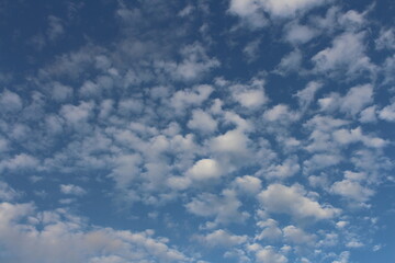 A blue sky with white clouds