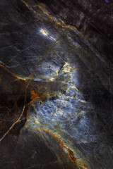 .Marble background. Brown and blue marble. Background for designers.Copy space.Selective focus.Vertical photo.