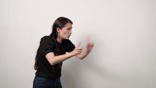 Woman in black shirt scolding her son for something he did, woman upset with another person for the damage done, desperate business manager with her workers on a white background