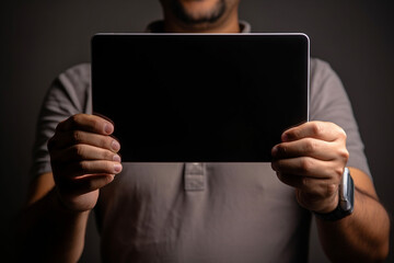Man holding an ipad