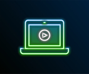 Glowing neon line Online play video icon isolated on black background. Laptop and film strip with play sign. Colorful outline concept. Vector