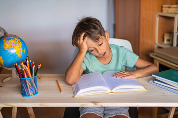 Little 8 Year Old Boy Doing Homework