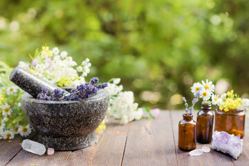 Fototapeta na wymiar Homeopathy and herbal medicine concept outdoors