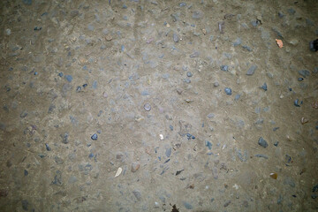concrete wall background with a texture of small stones