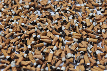 Many smoked cigarettes. Environmental pollution. Smoking harms health. Problems and depression. A...