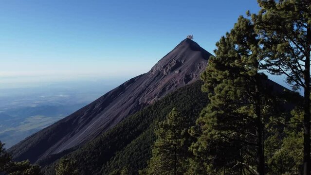 Filmed during a campout on Acatenango Volcano in 2022, "Vulcan de Fuego&acute;&acute;" erupts and smoke plumes lift up against the rising sun. Watching the raw power of the earth has something majestic.