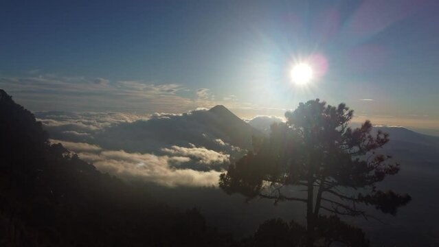 Filmed during a campout on Acatenango Volcano in 2022, "Vulcan de Fuego&acute;&acute;" erupts and smoke plumes lift up against the rising sun. Watching the raw power of the earth has something majestic.