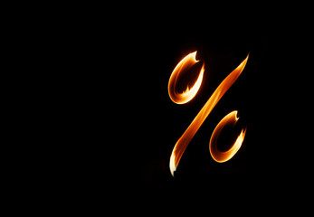 Percentage symbol made from burning flame on black background, hot sale discount. Generative AI 