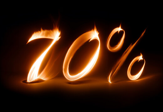 70% off value symbol made from burning flame, on black background, hot sale discount. Generative AI 