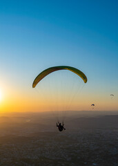 Paragliding in the late afternoon. Pedra Grande, located in Atibaia, Brazil