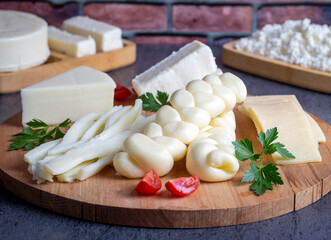 Traditional various cheeses, string, knitted and cecil cheese, turkish delicatessen concept