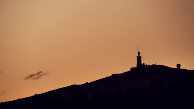 Time lapse. Sunset over summit of Mont Ventoux, mountain in Provence region, France.