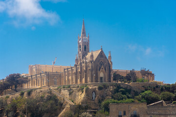 Fototapeta na wymiar Church up on the cliff of Gozo Island, Malta