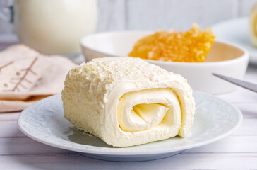 Turkish creamy dairy product. Clotted cream (butter cream) for Turkish breakfast with glass of milk. (Turkish name; kaymak)