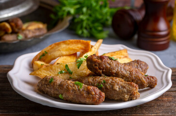 Traditional Turkish food; dry meatballs or inegöl meatballs with potatoes (Turkish name; Kuru kofte or anne koftesi)