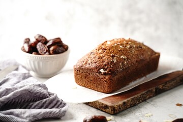 Homemade healthy date nut bread loaf, selective focus