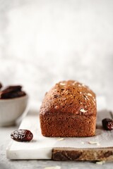 Homemade healthy date nut bread loaf, selective focus