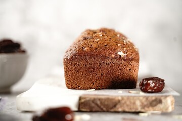 Homemade healthy date nut bread loaf, selective focus