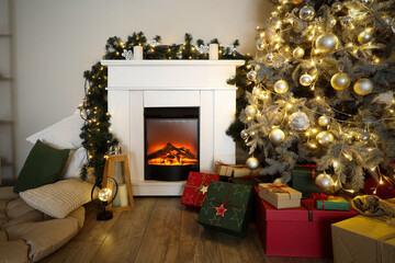 Christmas tree, gift boxes and fireplace in interior of living room