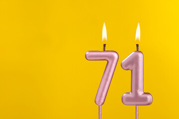 Candle 71 with flame - Birthday card on yellow luxury background